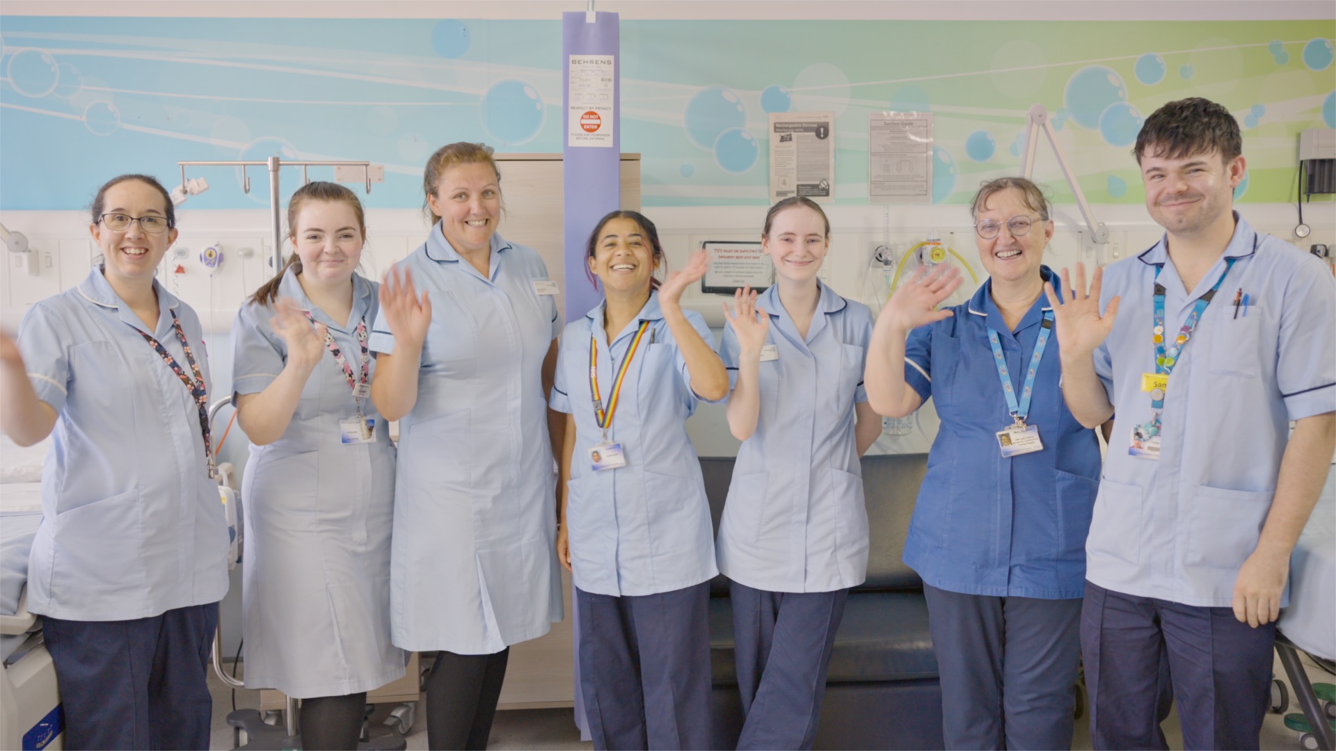 Ward staff waving