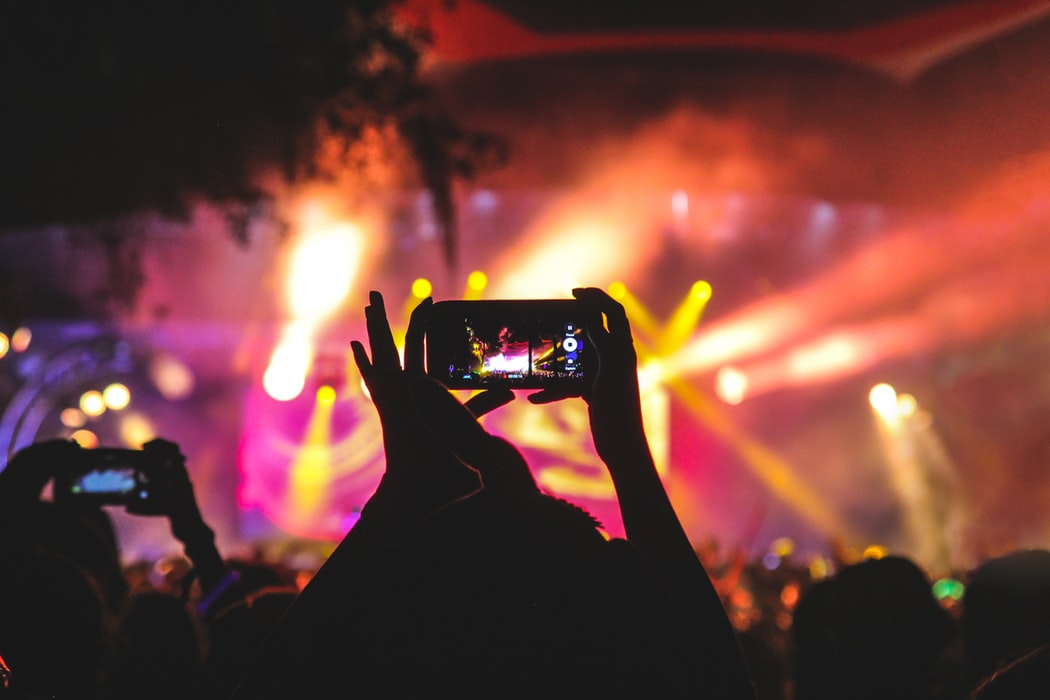 Picture of a phone at a concert