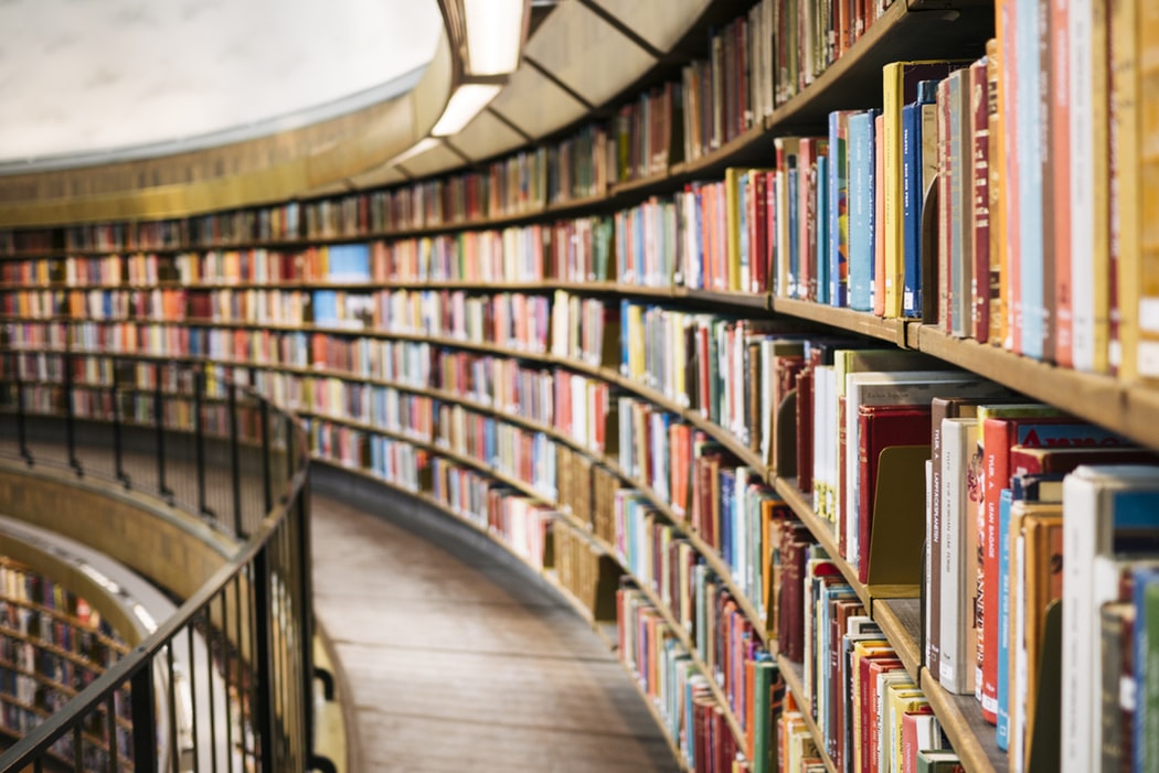 Picture of a curved wall of books