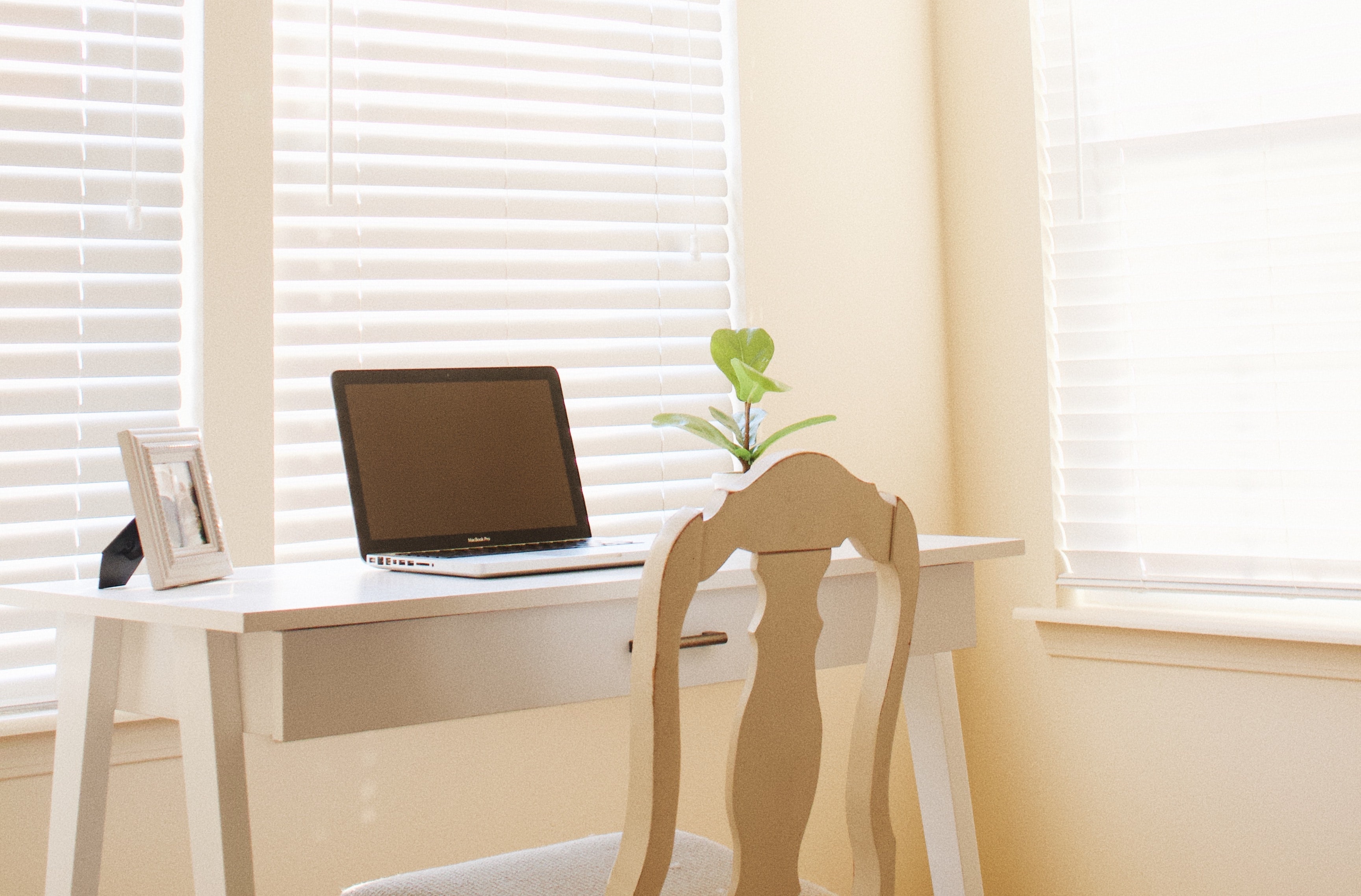 Picture of a desk with a laptop